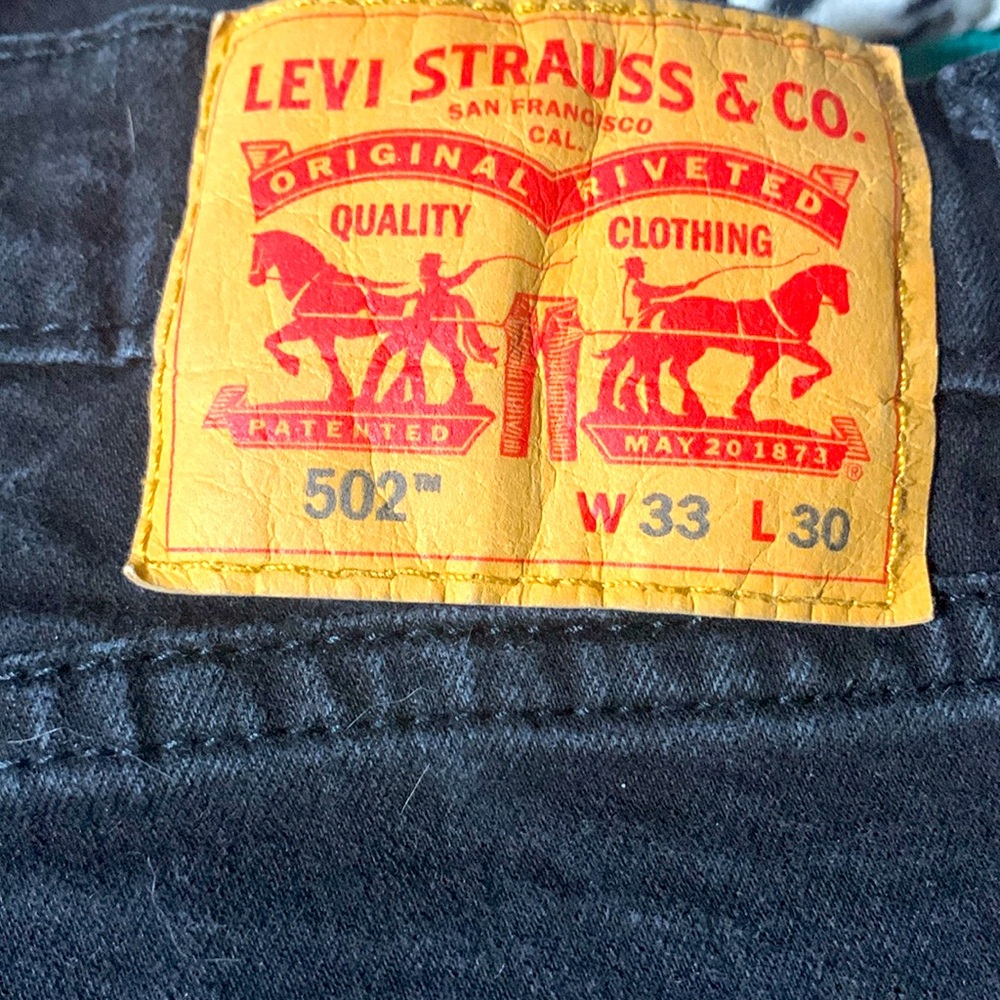 LEVI 502 33-30 zip fly black jeans